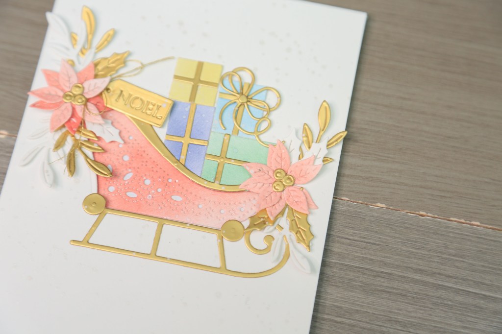 Spellbinders Delivering Joy sleigh die used with unconventional holiday colours in card making