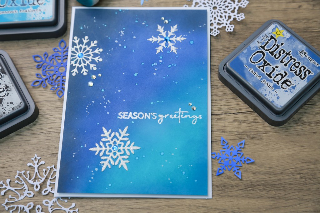 Snowflakes in the Night DIY Holiday Card with ink blended background and glitter snowflakes.