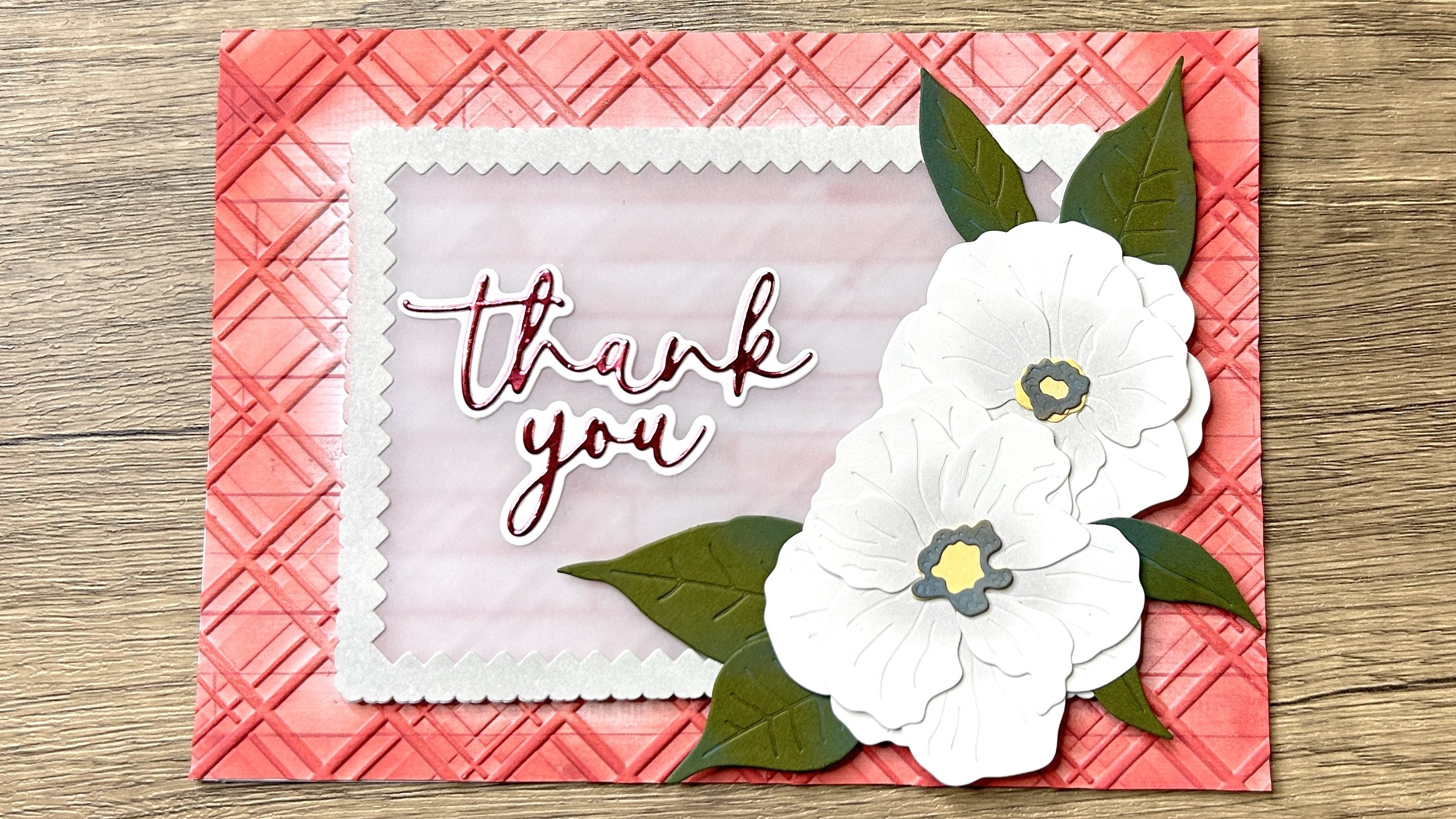 handmade card made with patterned paper that was transformed by ink blending and embossing