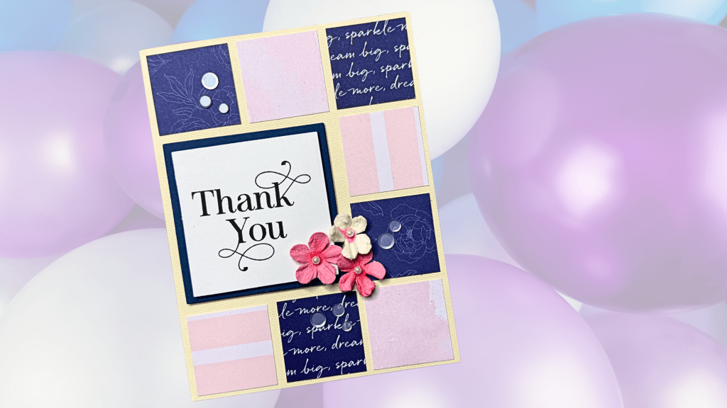 A handmade thank you card featuring a navy and pastel color scheme with patterned paper, a central thank you message, and decorative flowers against a soft background of balloons.