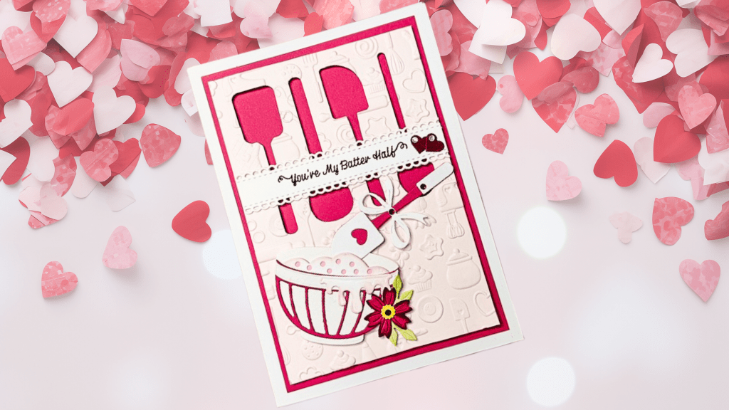 A decorative greeting card featuring a bowl, spatulas, and the text 'You’re My Batter Half' on a textured background, surrounded by scattered pink and white heart-shaped confetti.